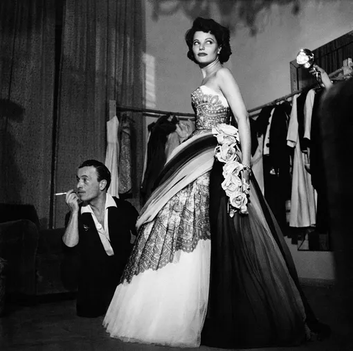 Фотограф Роберт Капа и актриса Джеральдин Брукс в платье Emilio Schuberth, 1951 год