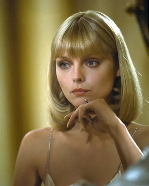 Мишель Пфайффер в фильме «Лицо со шрамом» (1983) Мишель Пфайффер в фильме «Лицо со шрамом» (1983)