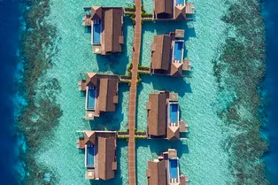 Отпуск мечты: виллы для влюбленных, 11 ресторанов и аквакомплекс в Waldorf Astoria Maldives Ithaafushi