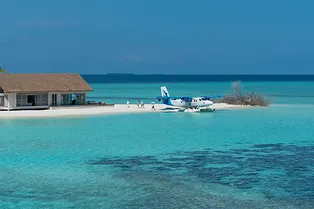 Почему надо побывать на первом частном острове Four Seasons на Мальдивах