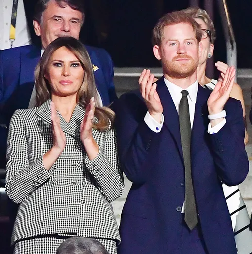 ...а принц Гарри наслаждается церемонией открытия вместе с Меланией Трамп