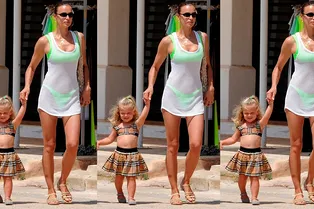 Неоновое бикини и платье-сетка: Ирина Шейк отдыхает с дочкой на Ибице