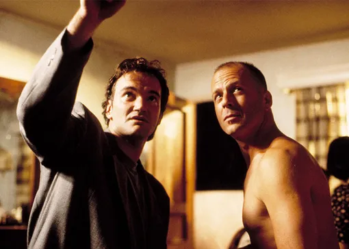 Квентин Тарантино и Брюс Уиллис во время съемок фильма «Криминальное чтиво», 1994 год